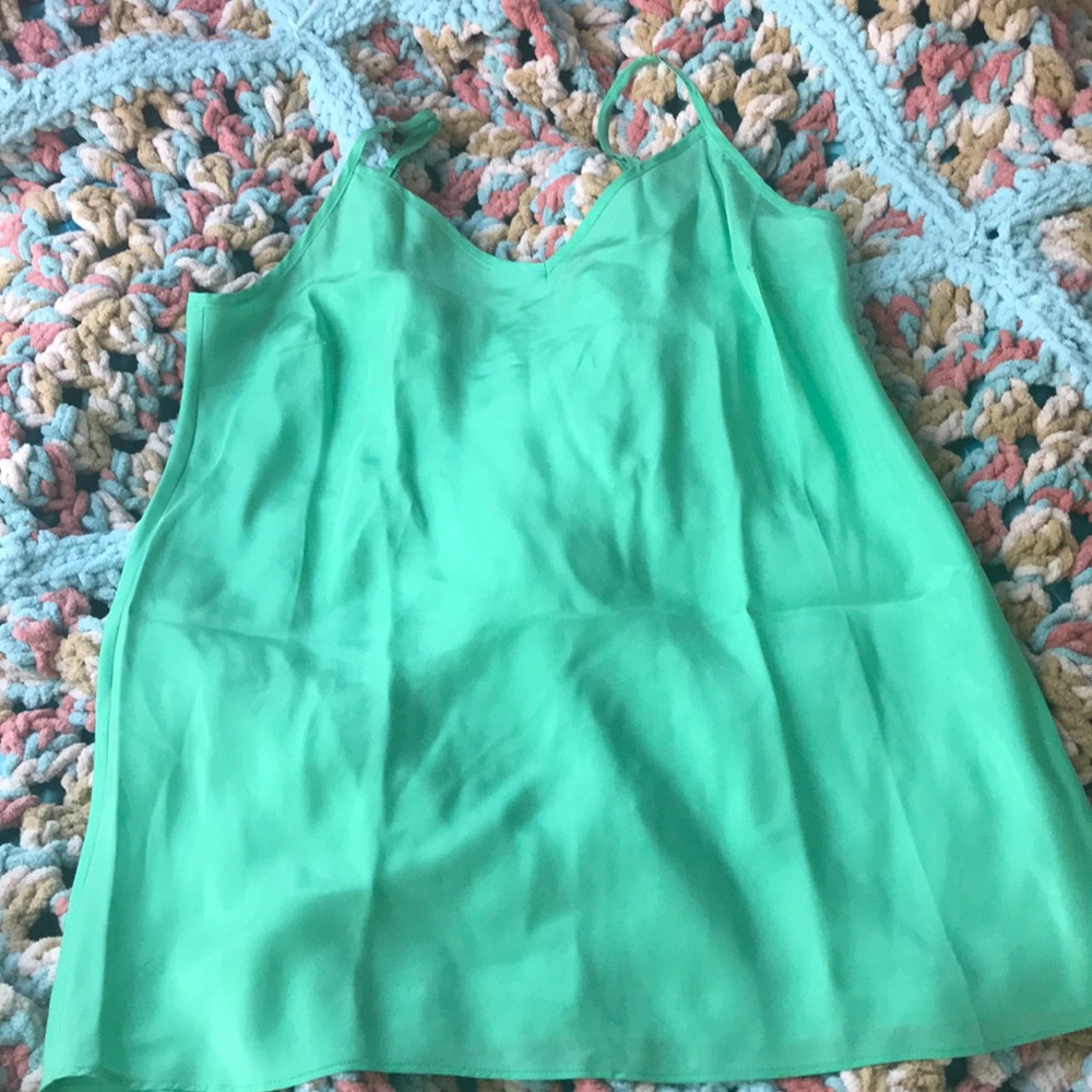I am selling a slightly used green tank top.